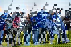 Group of people celebrating on stage