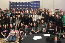 Group of people celebrating on stage