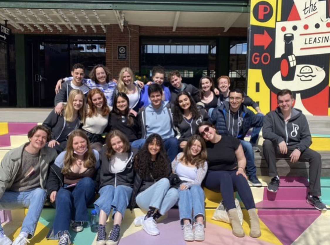 Group of people celebrating on stage