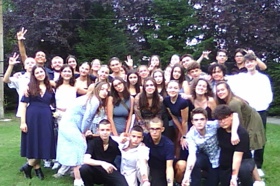 Group of people celebrating on stage