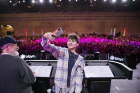 Group of people celebrating on stage