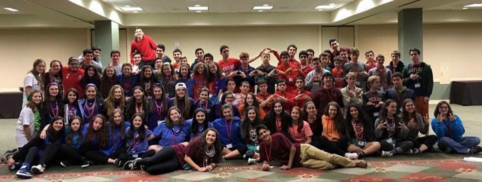 Group of people celebrating on stage