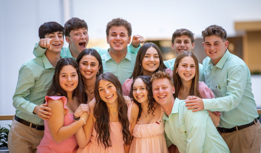 Group of people celebrating on stage