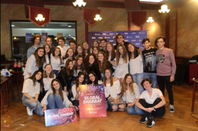 Group of people celebrating on stage