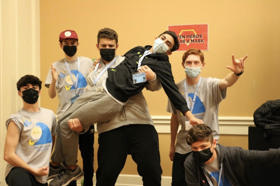 Group of people celebrating on stage