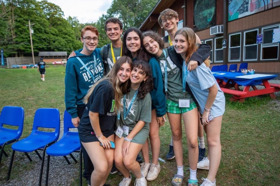 Group of people celebrating on stage