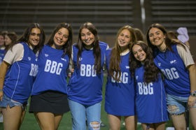 Group of people celebrating on stage