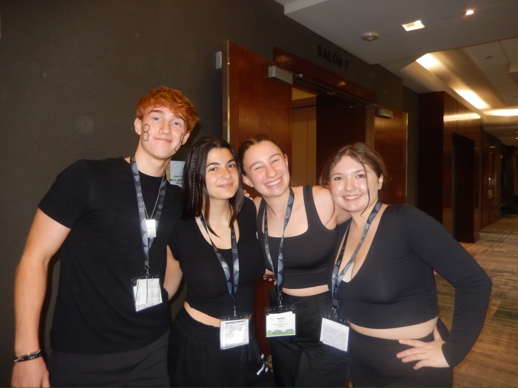 Group of people celebrating on stage