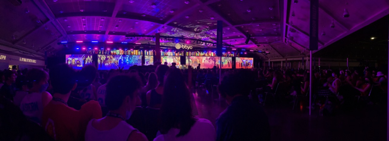 Group of people celebrating on stage