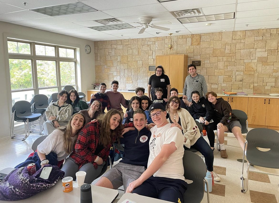 Group of people celebrating on stage