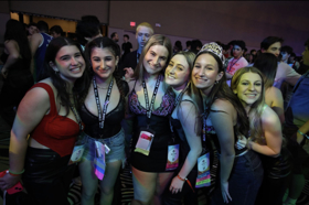 Group of people celebrating on stage