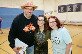 Group of people celebrating on stage
