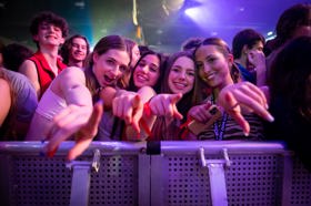 Group of people celebrating on stage