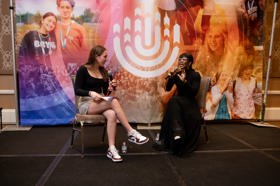 Group of people celebrating on stage