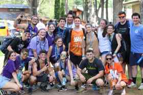 Group of people celebrating on stage