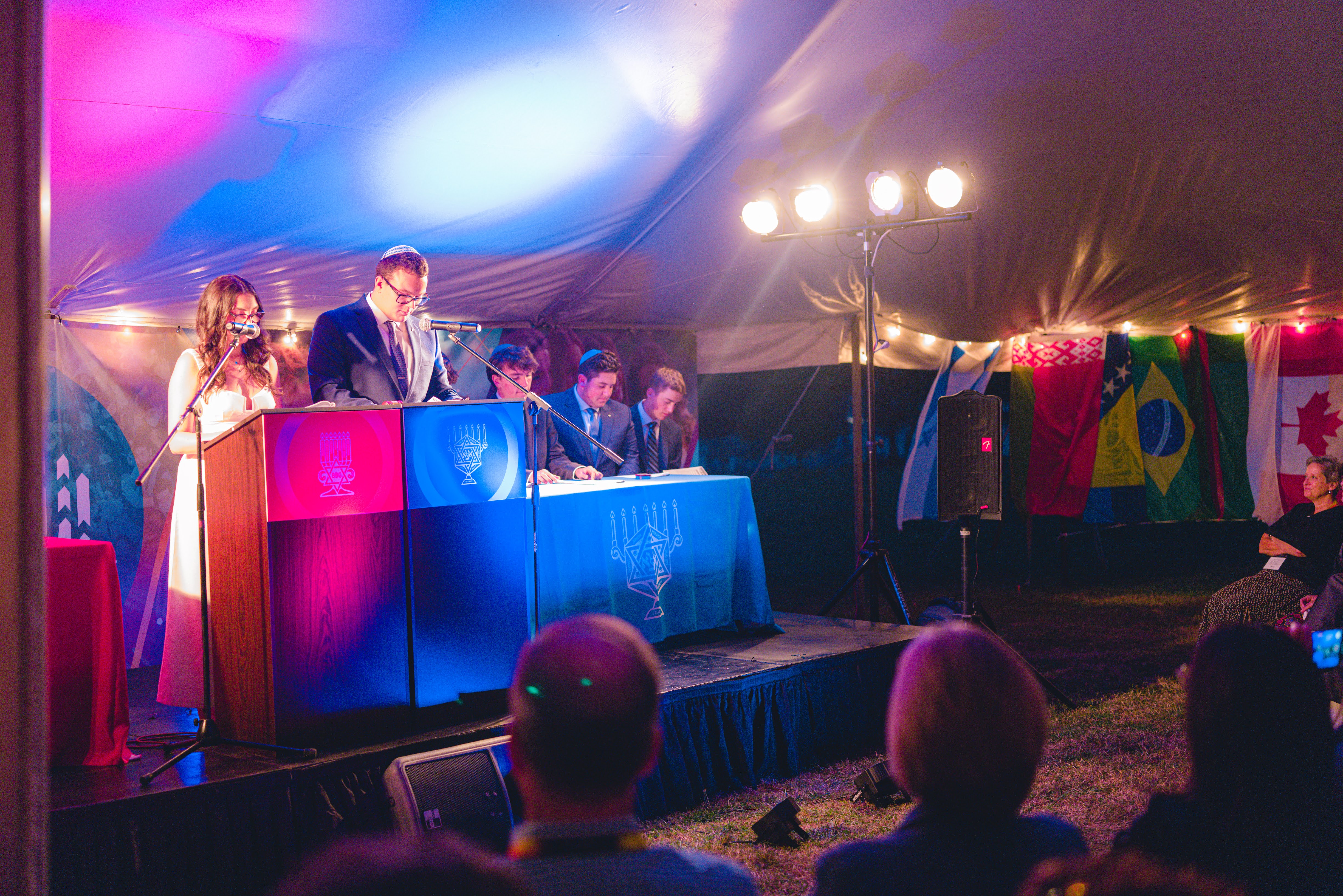 Group of people celebrating on stage