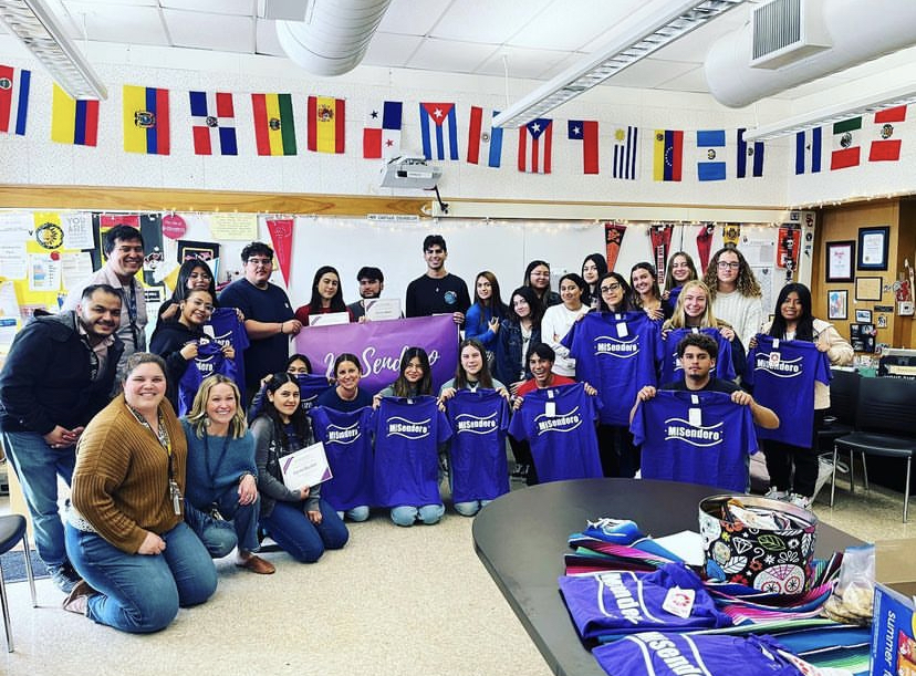 Group of people celebrating on stage