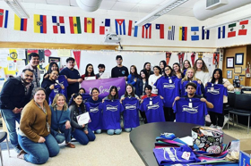 Group of people celebrating on stage
