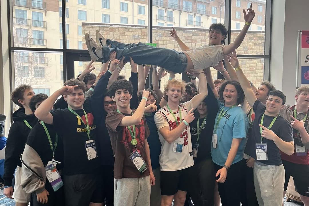 Group of people celebrating on stage