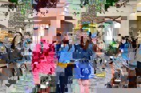 Group of people celebrating on stage