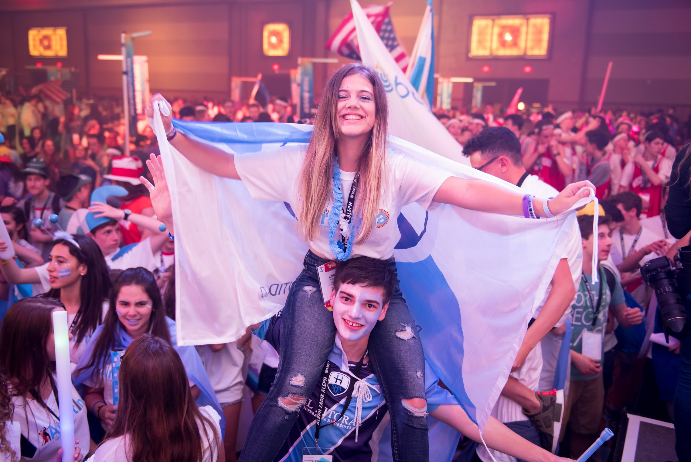 Group of people celebrating on stage