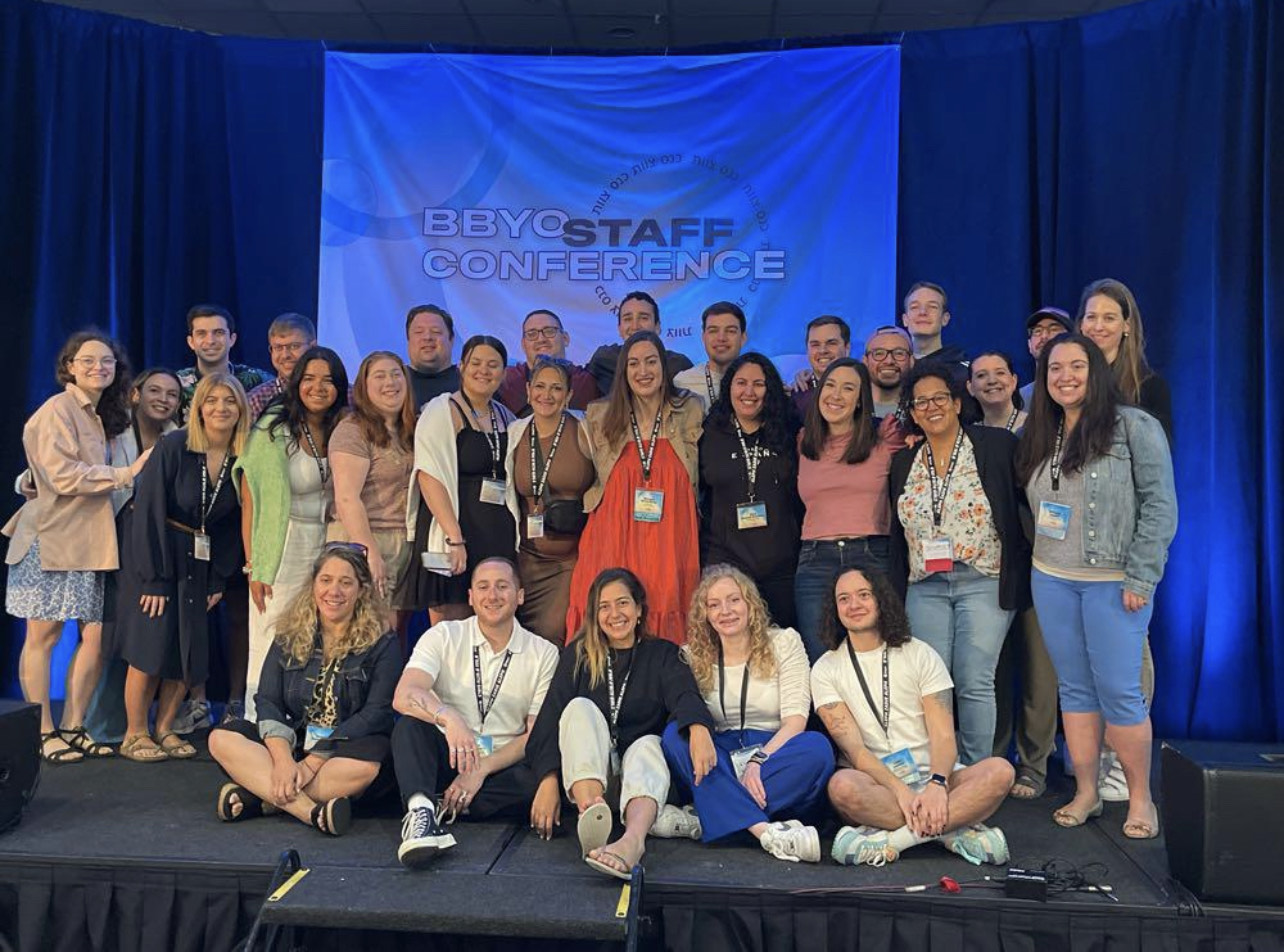 Group of people celebrating on stage