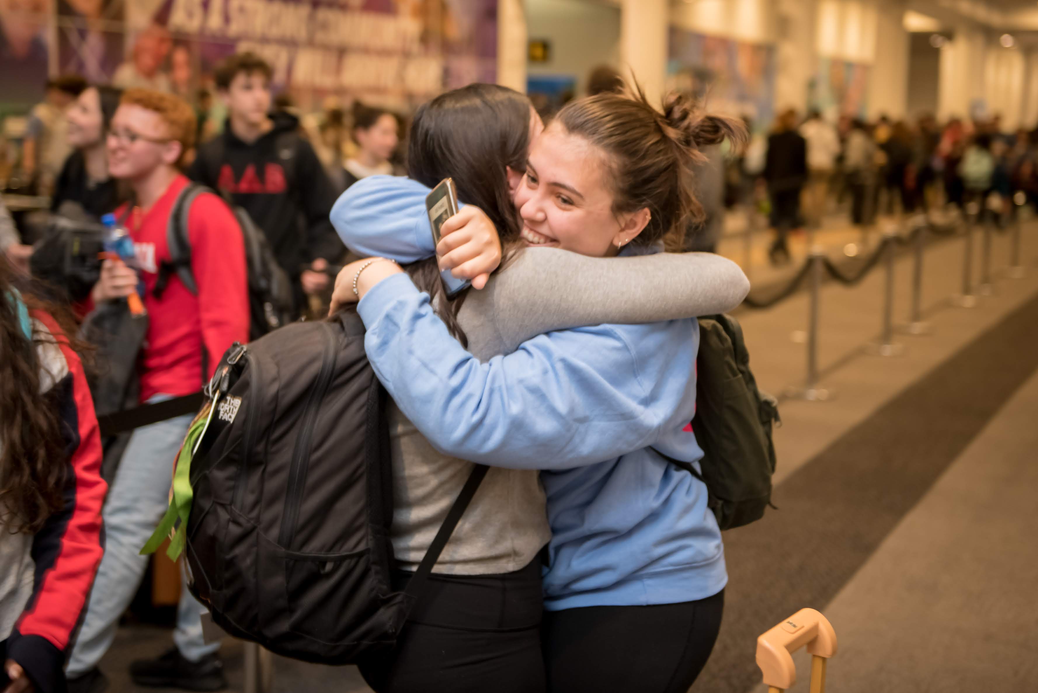 Group of people celebrating on stage