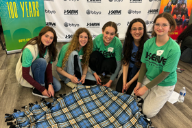 Group of people celebrating on stage