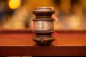 Group of people celebrating on stage