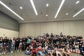 Group of people celebrating on stage