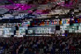 Group of people celebrating on stage