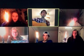 Group of people celebrating on stage