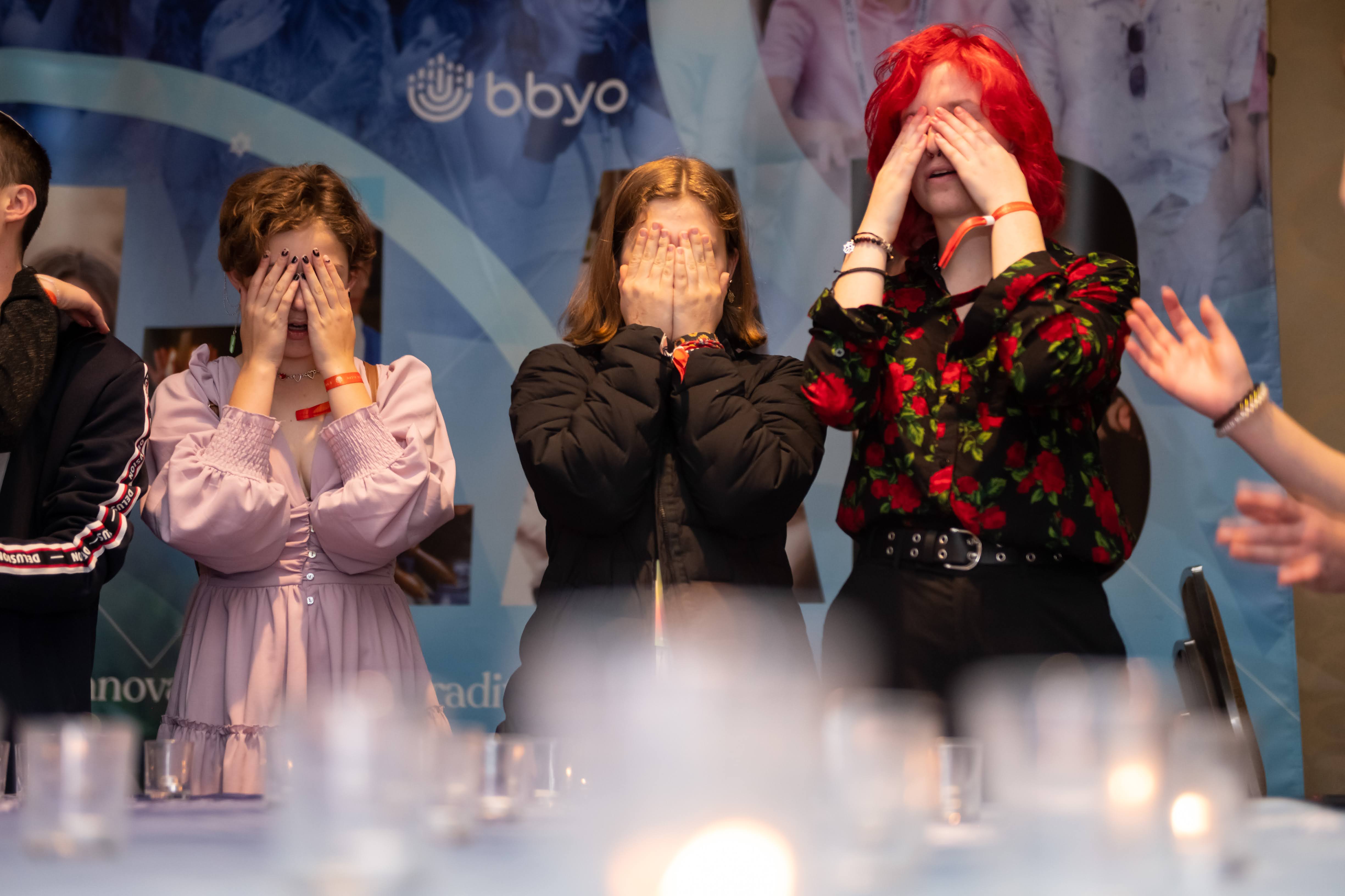 Group of people celebrating on stage