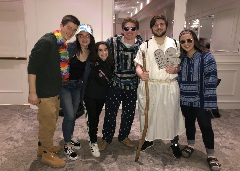 Group of people celebrating on stage