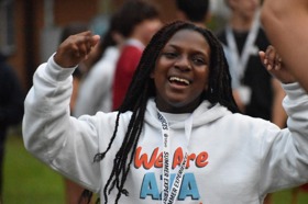 Group of people celebrating on stage