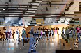 Group of people celebrating on stage