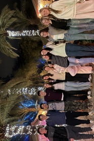 Group of people celebrating on stage