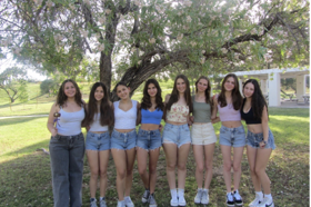 Group of people celebrating on stage