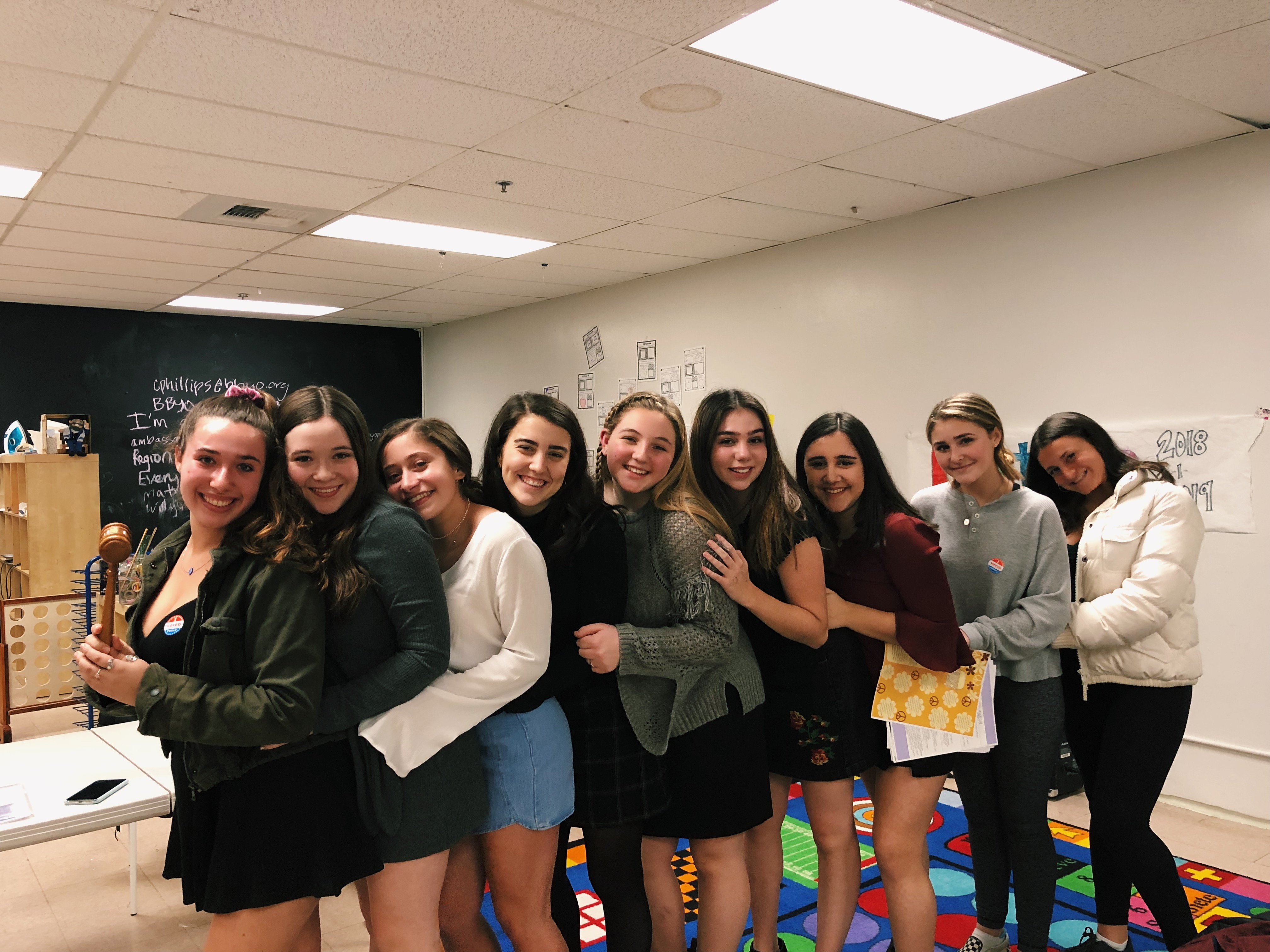 Group of people celebrating on stage