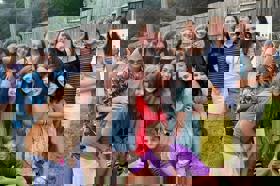 Group of people celebrating on stage