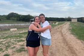 Group of people celebrating on stage