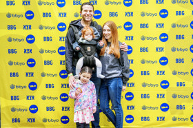 Group of people celebrating on stage