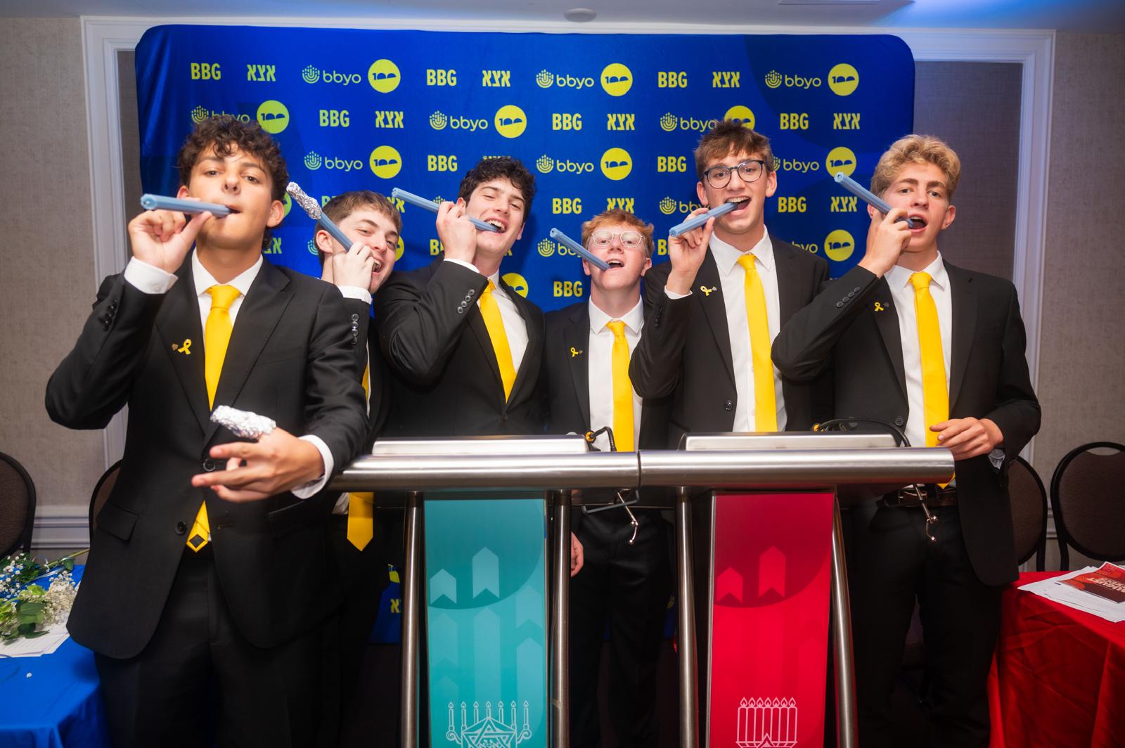 Group of people celebrating on stage