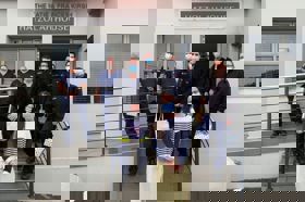 Group of people celebrating on stage