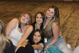 Group of people celebrating on stage