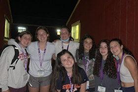 Group of people celebrating on stage