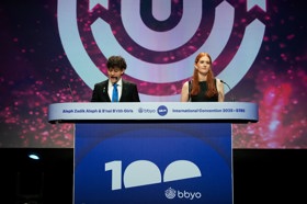 Group of people celebrating on stage