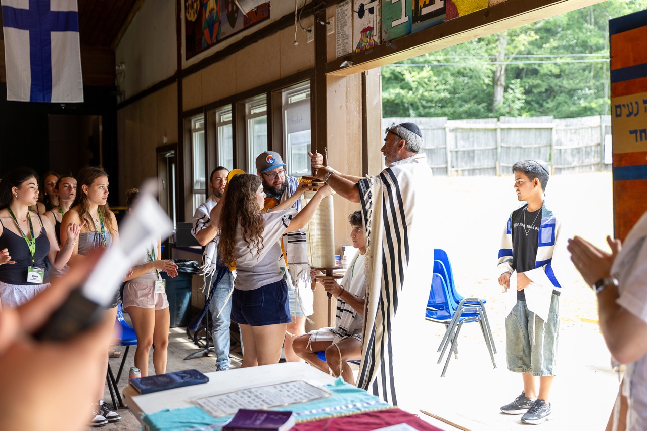 Group of people celebrating on stage