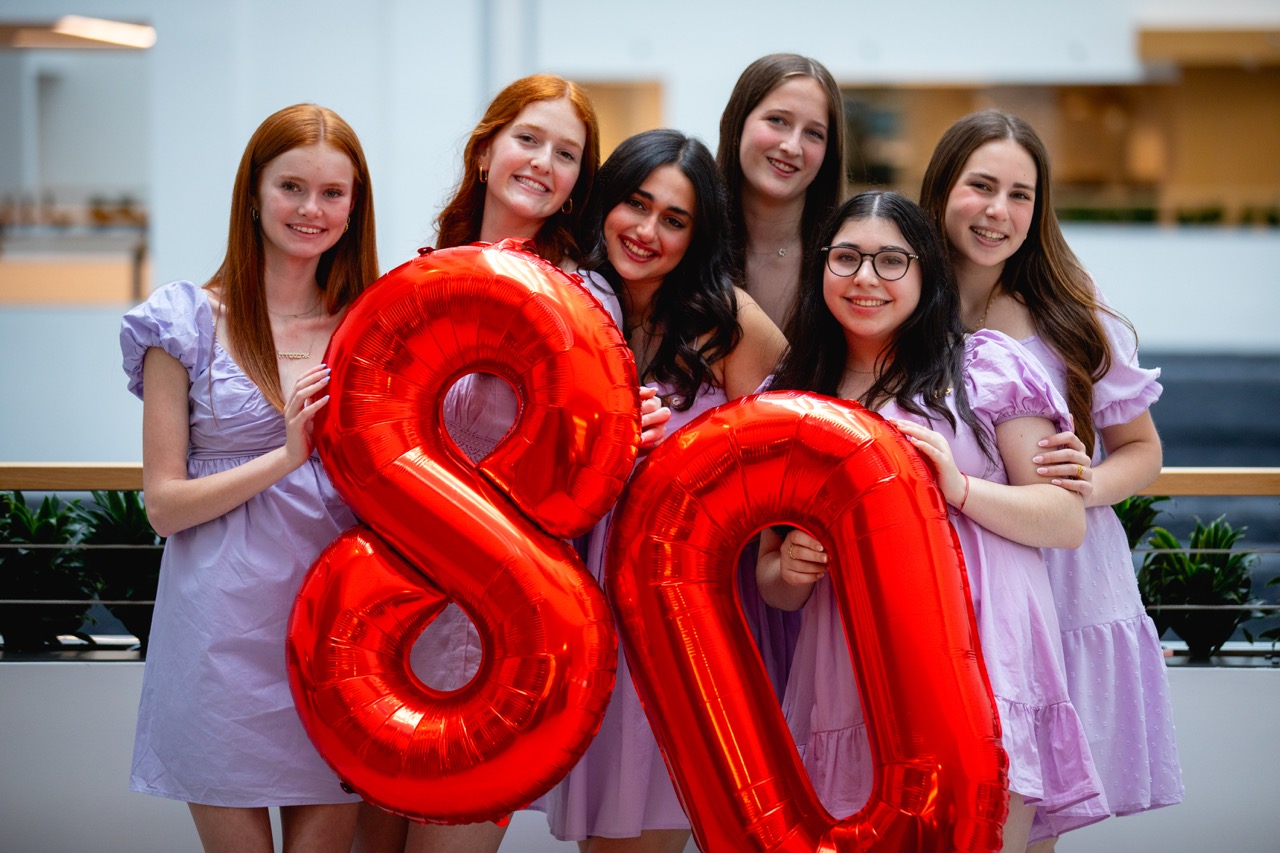 Group of people celebrating on stage