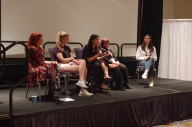 Group of people celebrating on stage